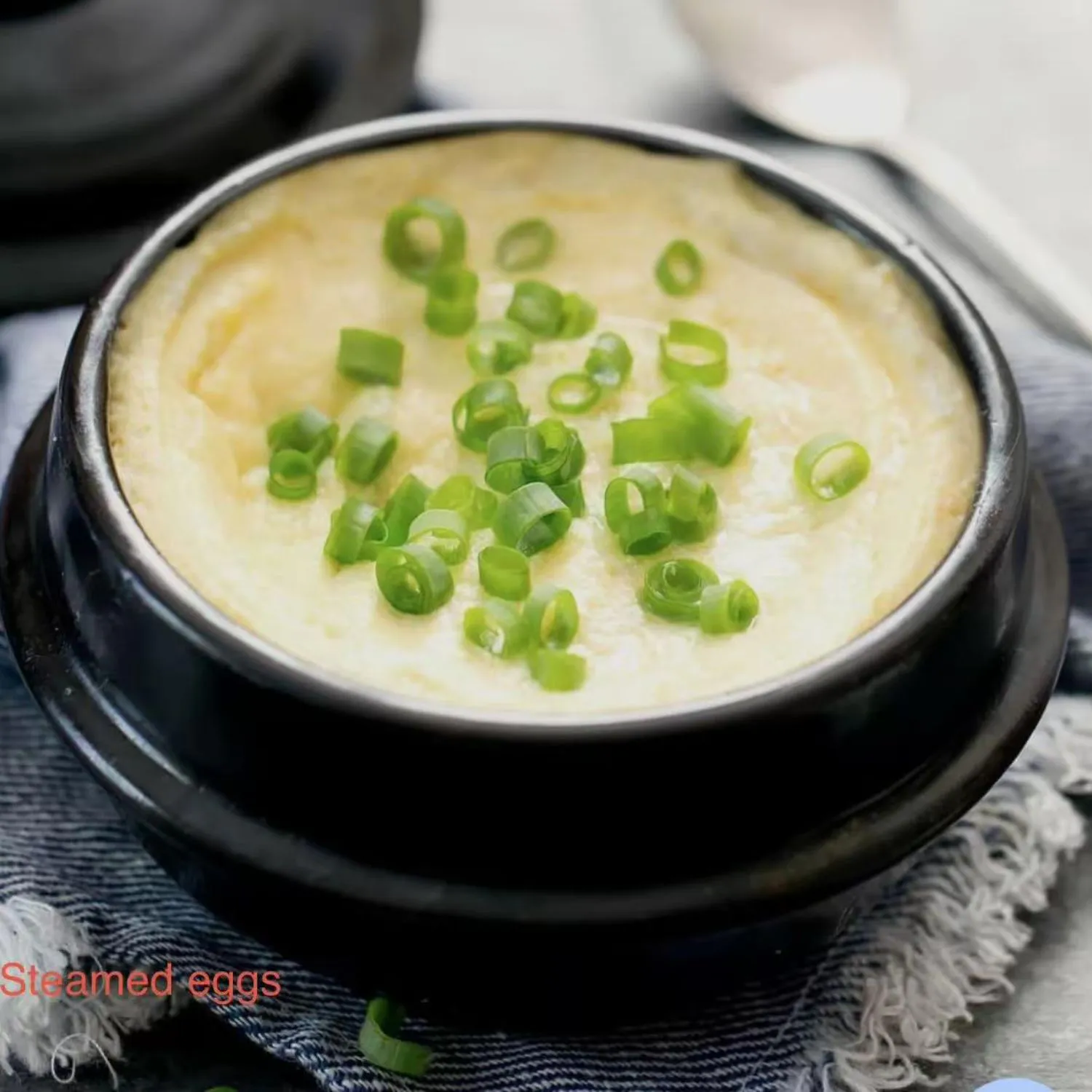 Silky steamed eggs with scallions at Shila Korean BBQ And Hot Pot, a Asian Fusion Restaurant in Oklahoma City