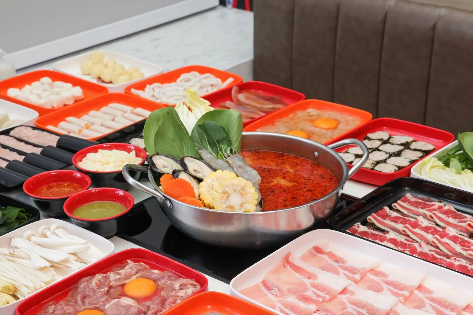 Spicy hot pot with assorted fresh ingredients at Shila Korean BBQ And Hot Pot, a Asian Fusion Restaurant in Oklahoma City